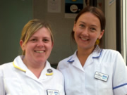 Photograph of two dental staff